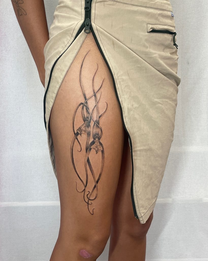 Abstrac Thigh tattoo