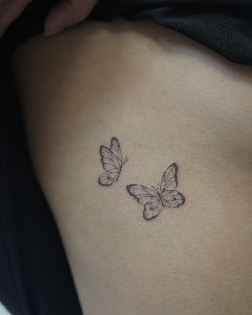 dainty butterfly tattoo